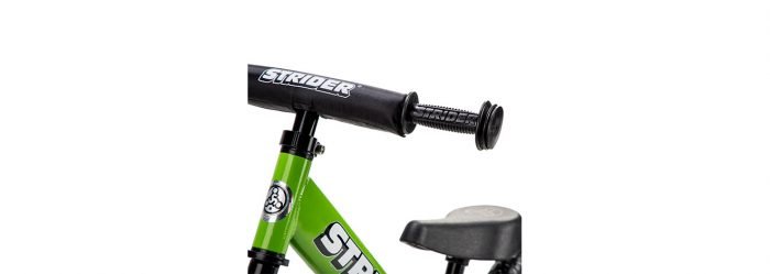 Strider Sport balance bike features padded handlebar and mini grips